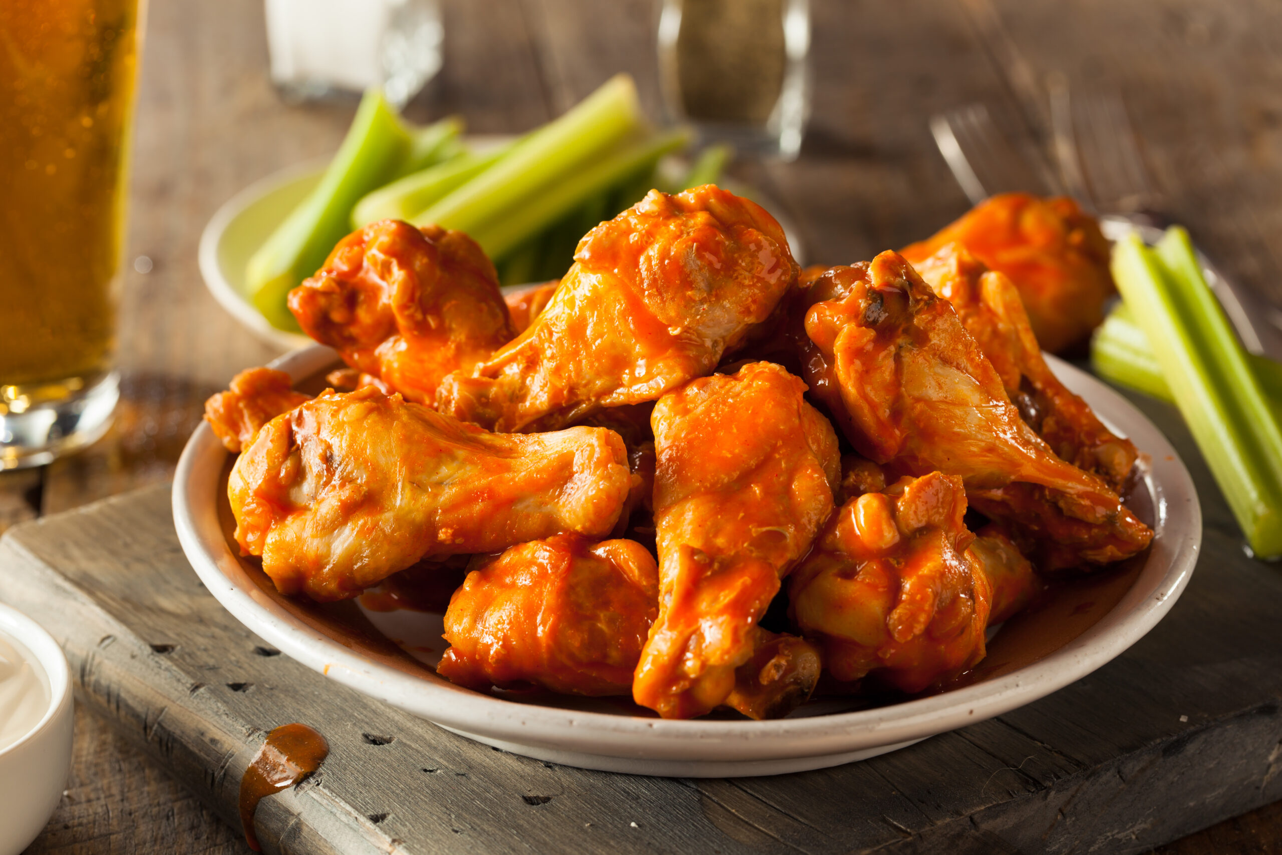 Spicy Homemade Buffalo Wings with Dip and Beer