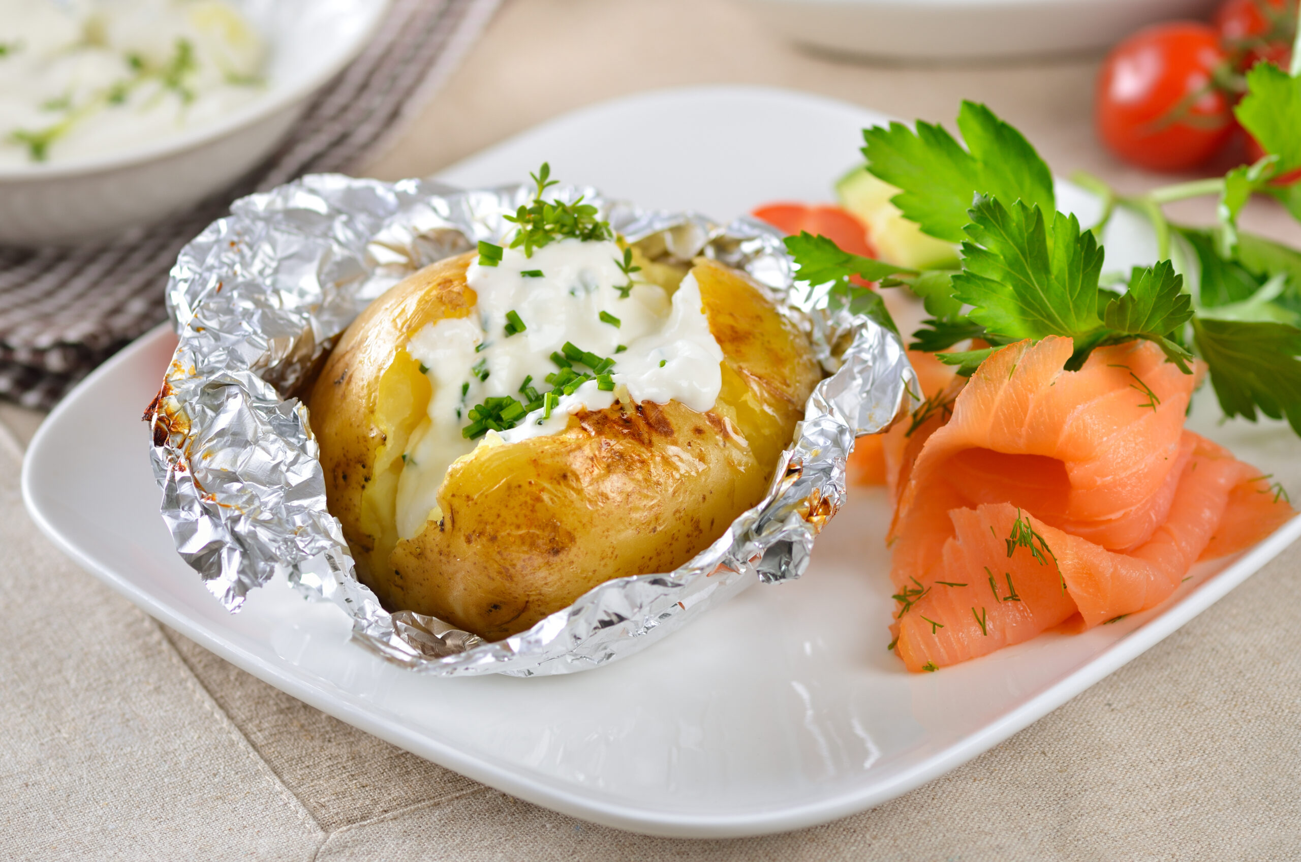 Jacket potato with sour cream and smoked salmon