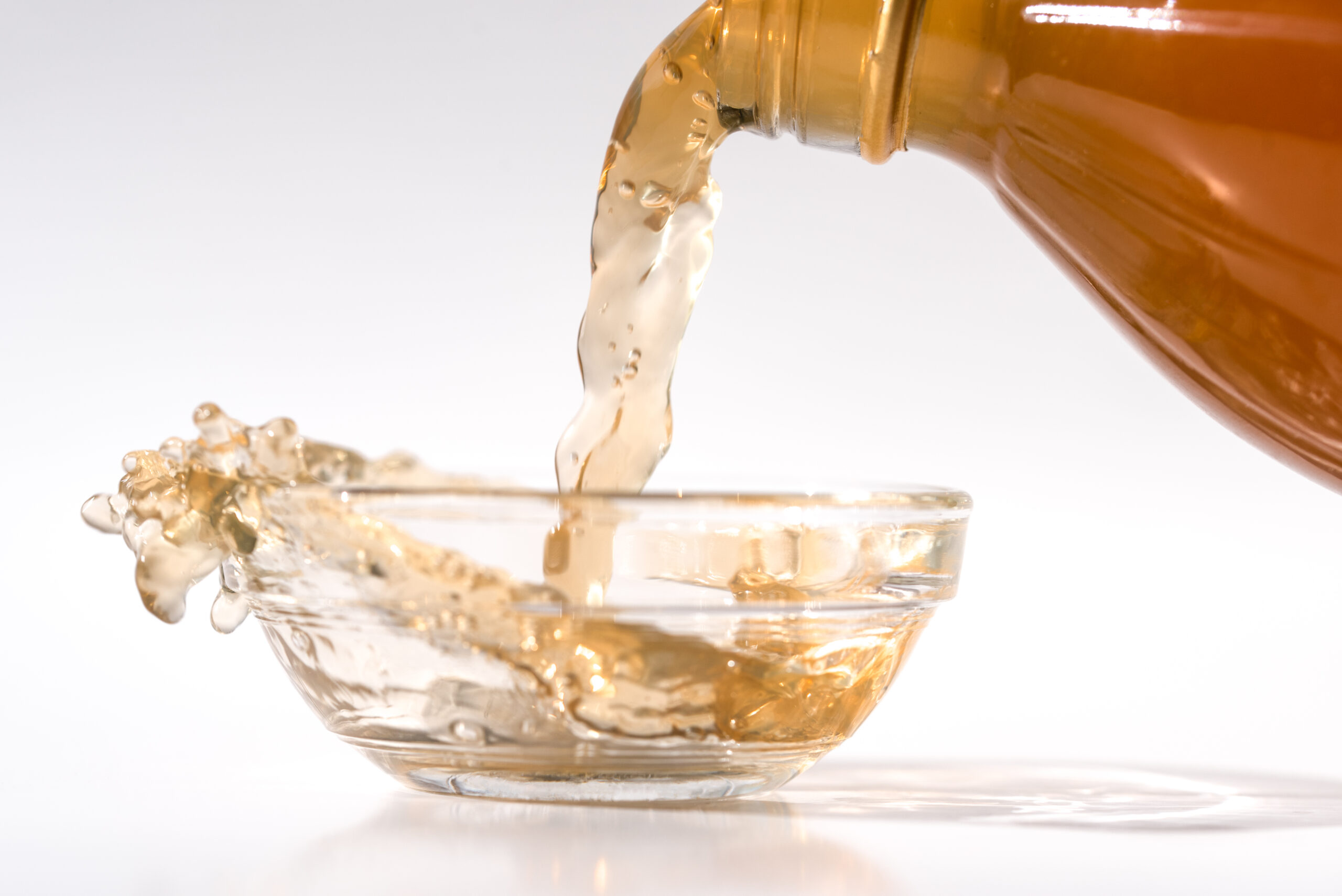 Apple Cider Vinegar Poured into an Ingredient Bowl