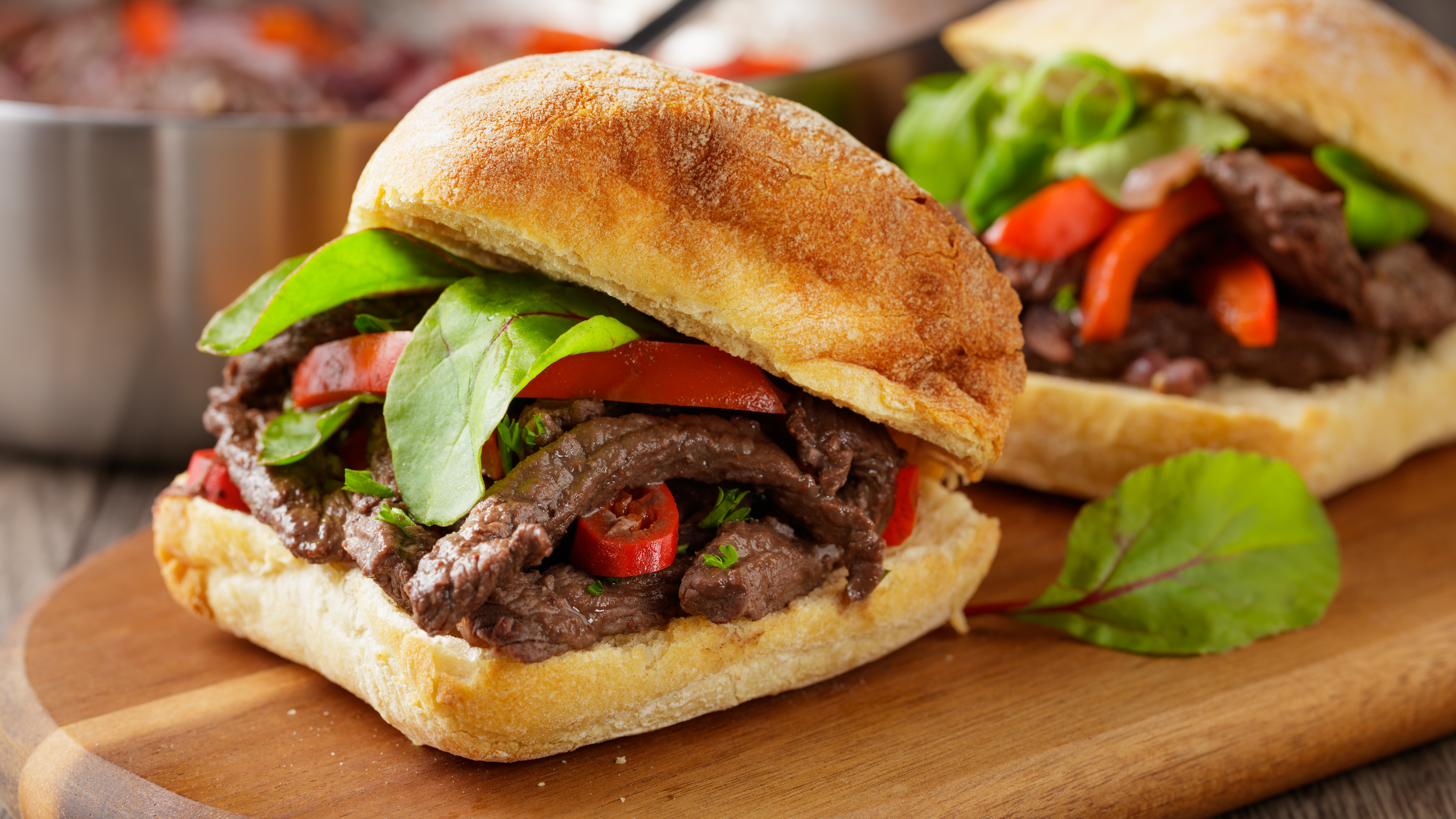 close view of beef, red pepper, and chilli ciabatta sandwich