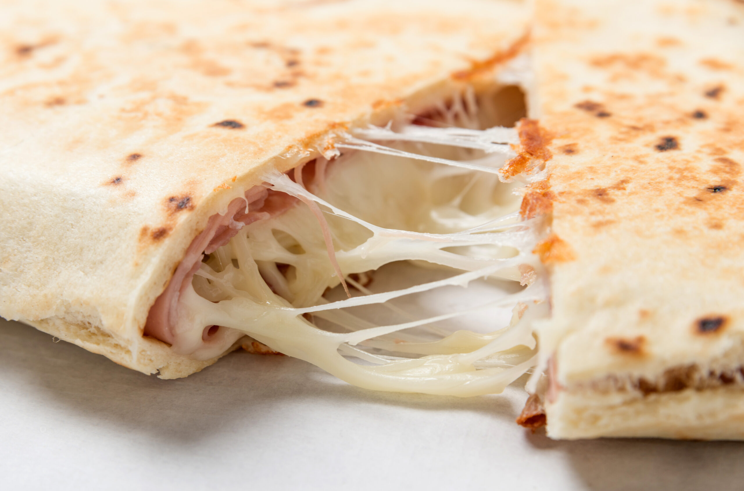 Ham and Cheese Quesadilla on White Background