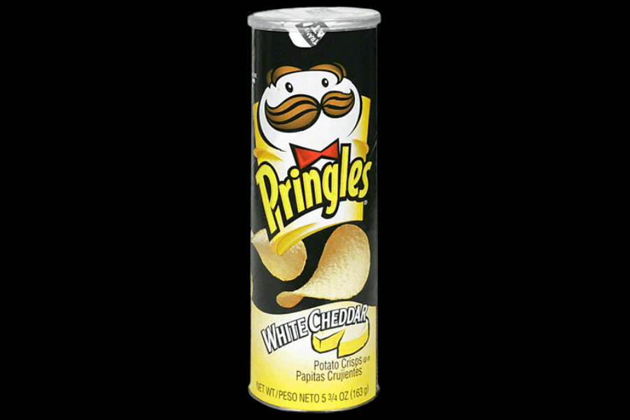 A can of Pringles in the "White Cheddar" flavor, featuring a sleek black and yellow design. The packaging highlights the Pringles mascot and an image of golden potato crisps alongside blocks of white cheddar cheese. The flavor name is prominently displayed on the lower part of the can.