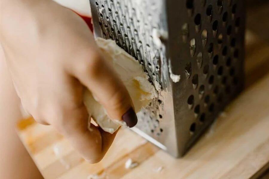 hand grating butter 