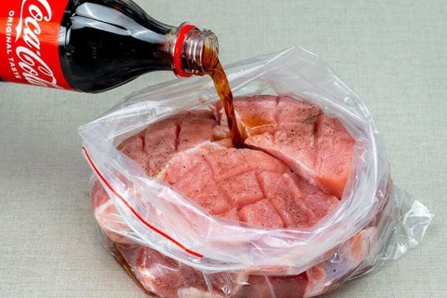 raw meat soaked in coca cola