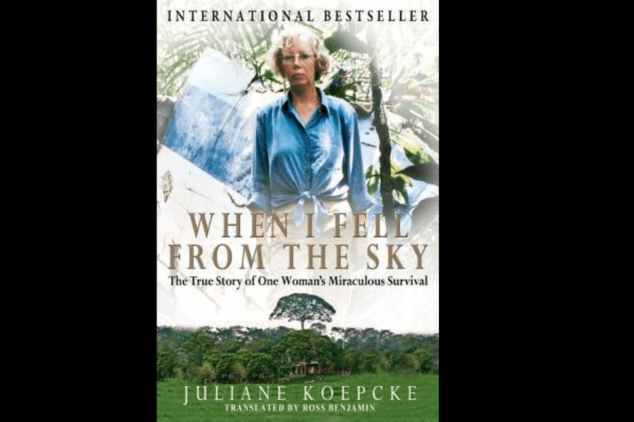 Book cover for When I Fell From the Sky by Juliane Koepcke, featuring a photo of the author in a blue shirt standing in a jungle setting, with torn airplane metal and rainforest imagery in the background. Subtext reads: “The True Story of One Woman’s Miraculous Survival.”