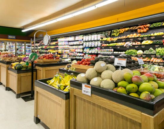 Produce section in grocery store wide angle