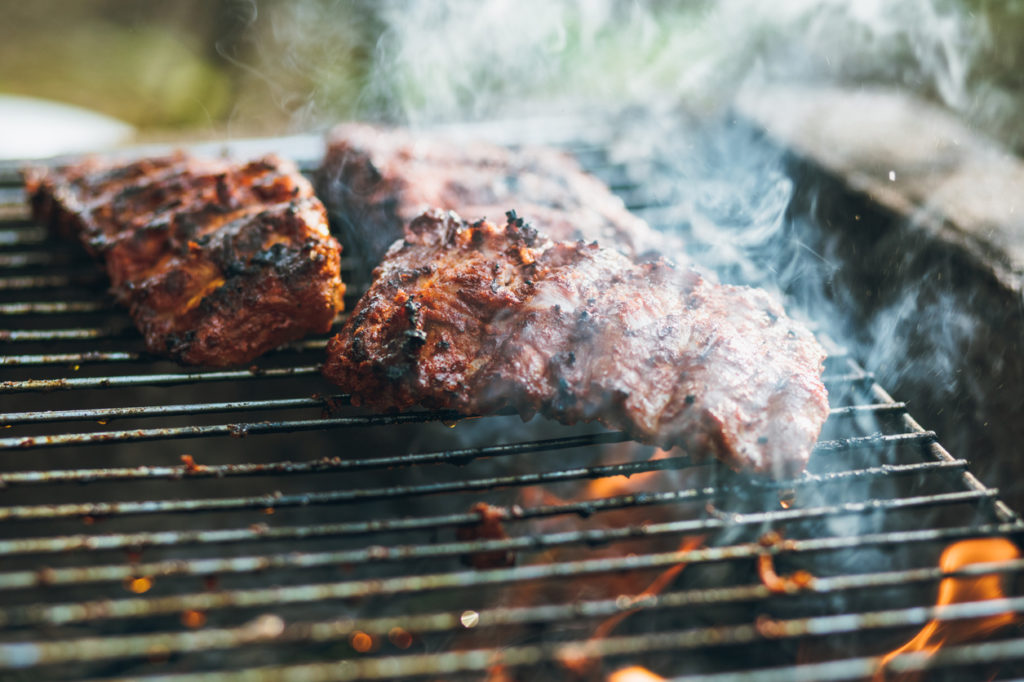 Ribs bbq'ing on a grill