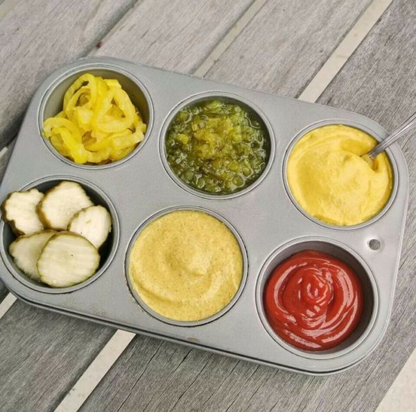 muffin pan of condiments