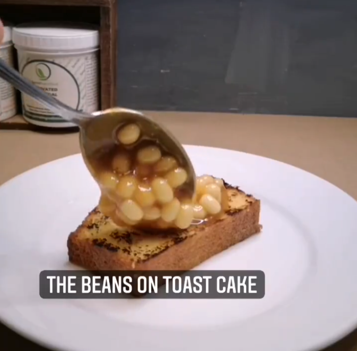 Beans being spooned onto toast, food illusion by chefbenchurchill on instagram