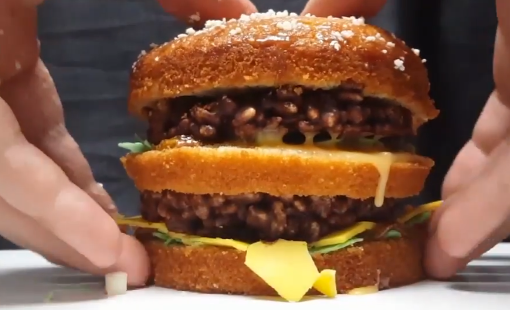 Cheeseburger made of cake and dessert foods, illusion by chefbenchurchill on instagram