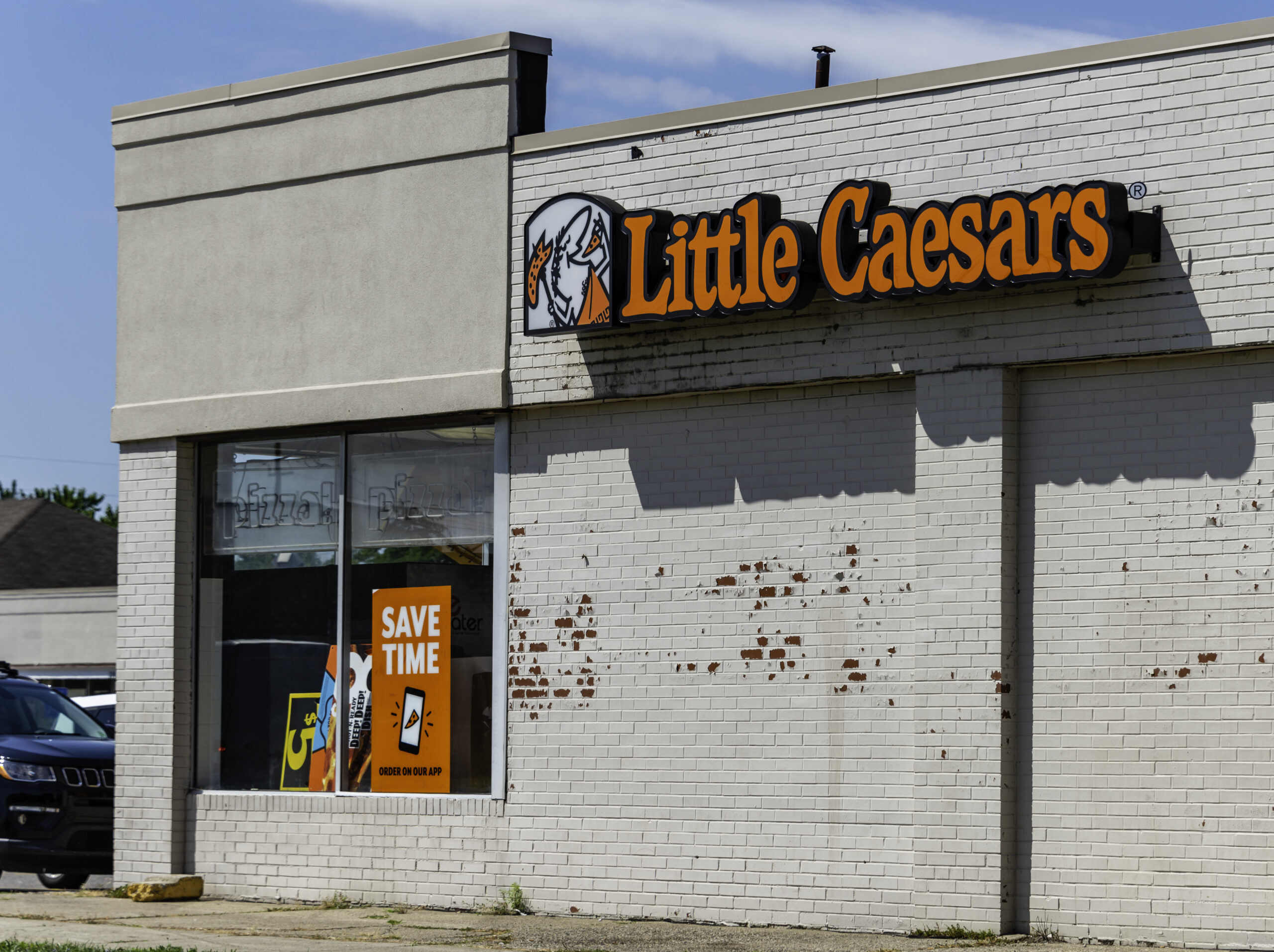 A Little Caesars pizza restaurant located in Madison Heights, Michigan. Little Caesars is a chain of pizzerias and was founded in 1959 by Mike Illitch in Garden City, Michigan and has grown to thousands of locations worldwide."