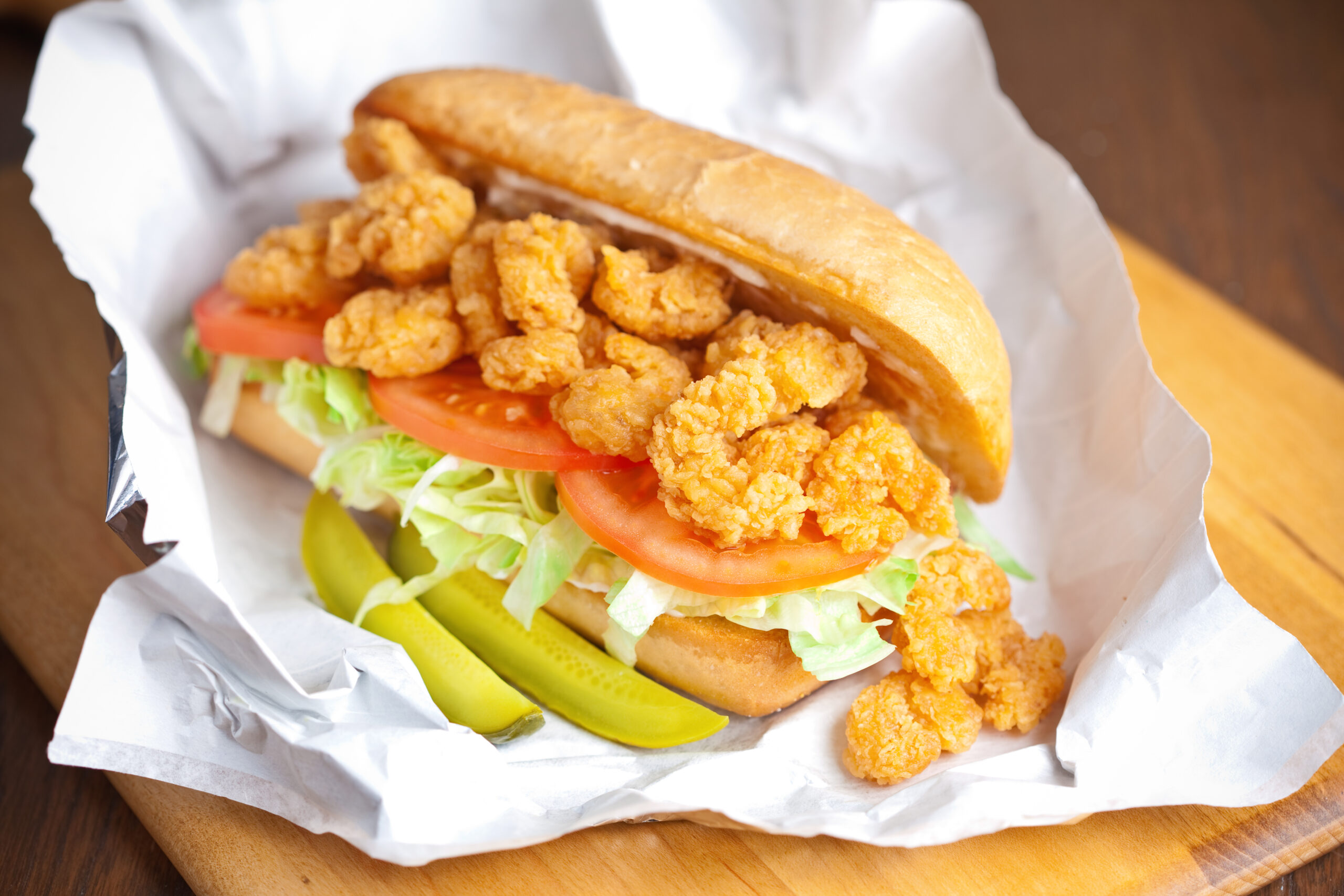 A traditional shrimp po' boy sandwich.  