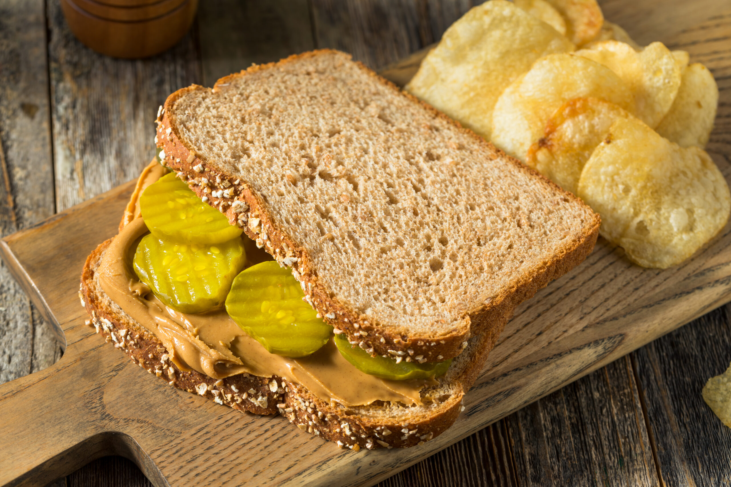 Homemade Peanut Butter and Pickle Sandwich with Chips