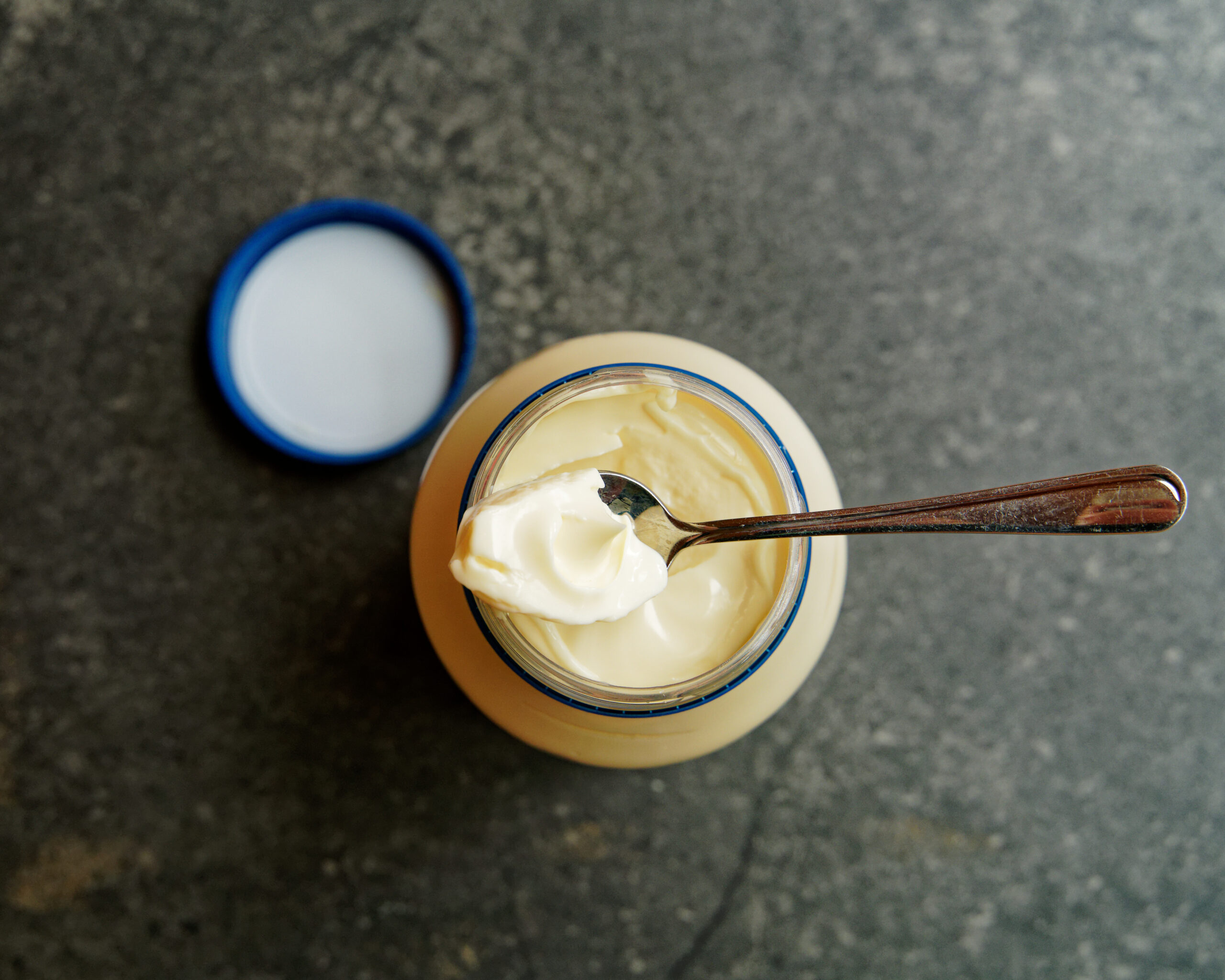 The best bit, the nipple on the top of the mayonnaise in a newly opened jar being spooned out to taste.