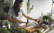 Asian women at home making healthy meal