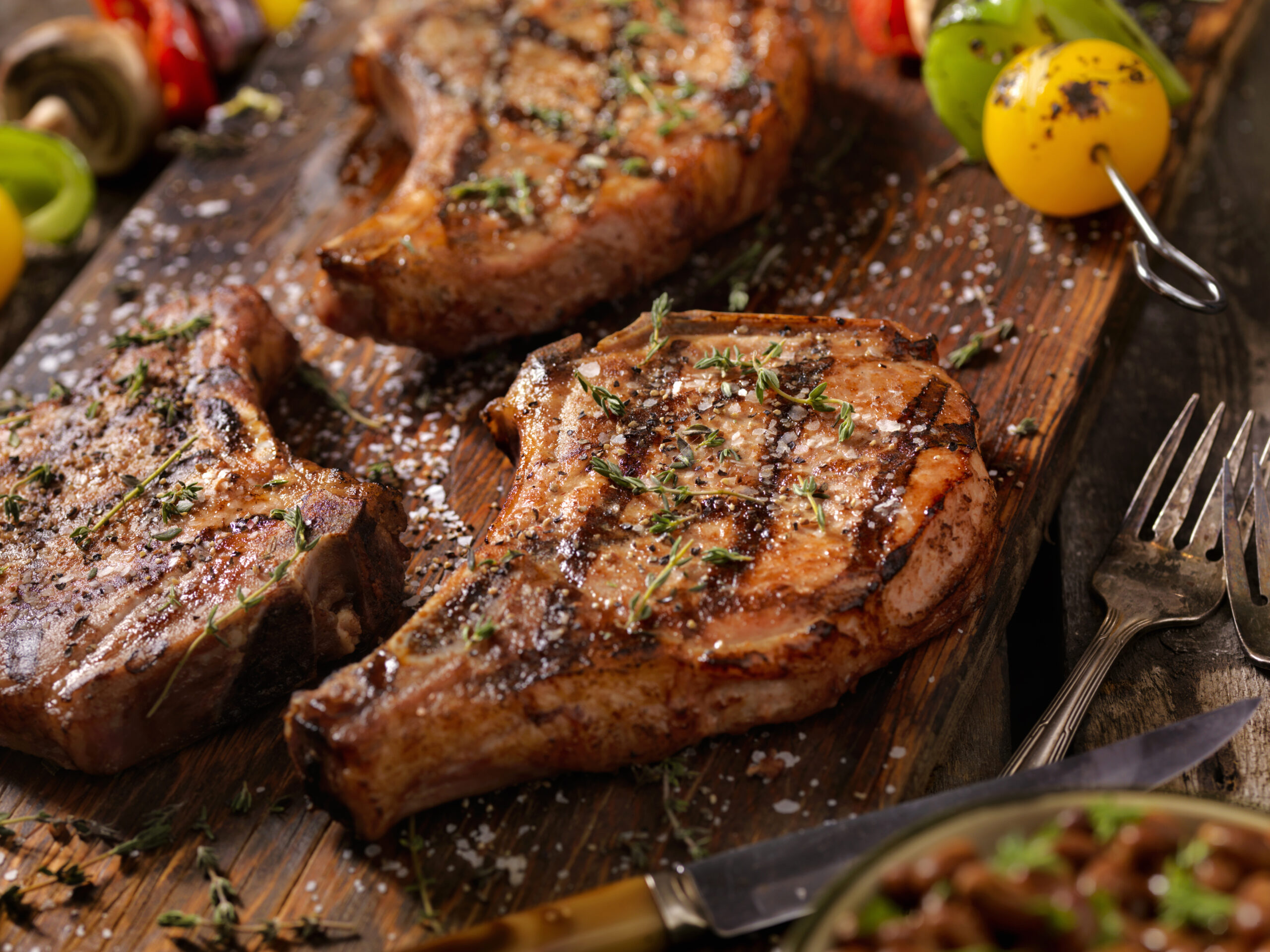 BBQ Pork Chops With Vegetable Skewers, Baked Beans and Coleslaw