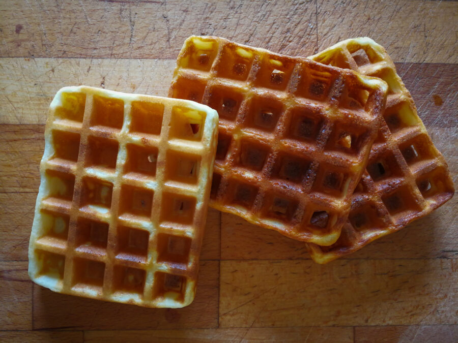 Dutch waffles on a wooden chopping board