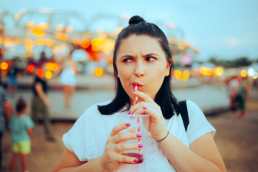 Unhappy teen at carnival