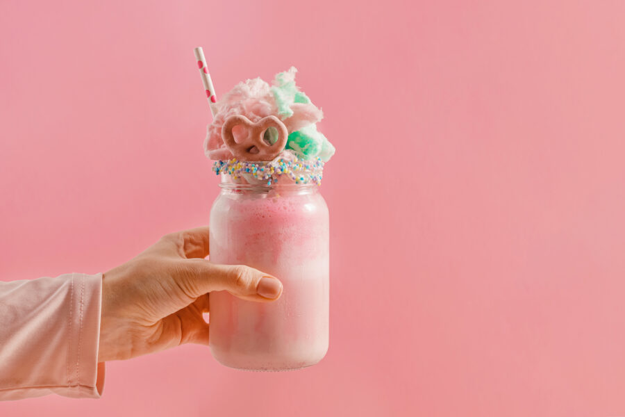 pink milkshake with whipped cream