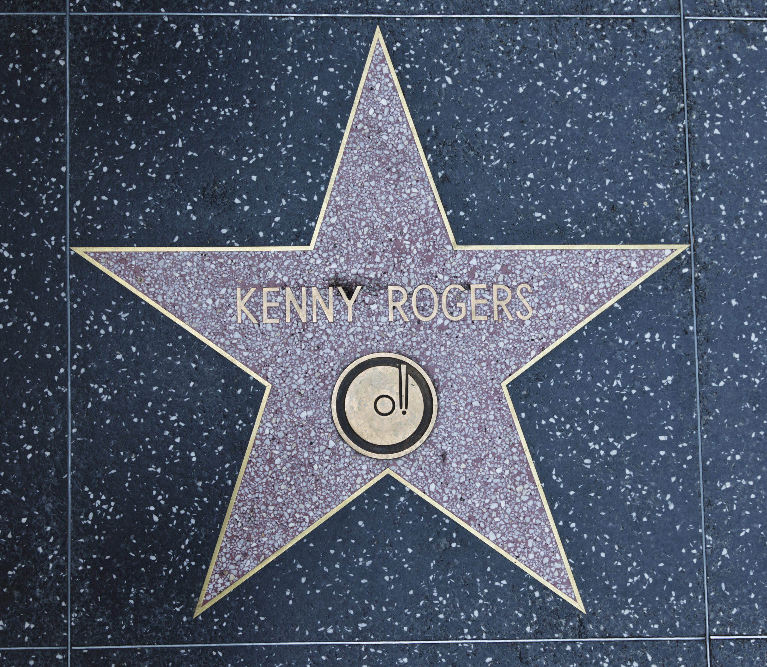 Los Angeles, USA - August 18, 2011:  The Hollywood Walk of Fame star of Kenny Rogers located on Hollywood Blvd. that was awarded in 1979 for achievement in the recording industry.