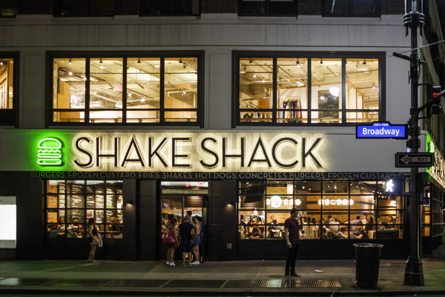 New York, New York, USA - July 15, 2016: Shake Shack near Herald Square in Manhattan. Shake Shack is a trendy food chain known for quality. People can be seen.