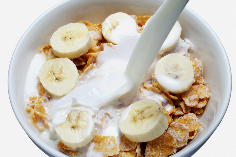 Cereal with slices of banana & milk