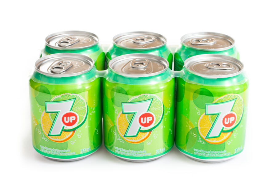 Product shot of a 6-pack of 7UP isolated on white, this shot featuring the smaller variety of cans. 