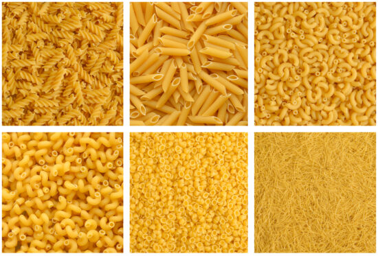 Collage of various raw dry yellow pasta.Fusilli, penne pasta, macaroni pipe, cavatappi pasta, small shell, Filini vermicelli