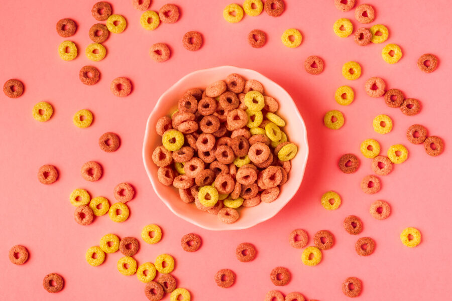 Colorful cereal rings in bowl. Top view.