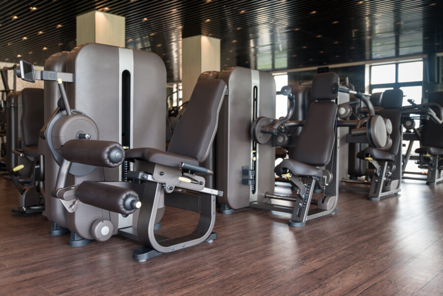 Equipment And Machines At The Modern Gym Room Fitness Center