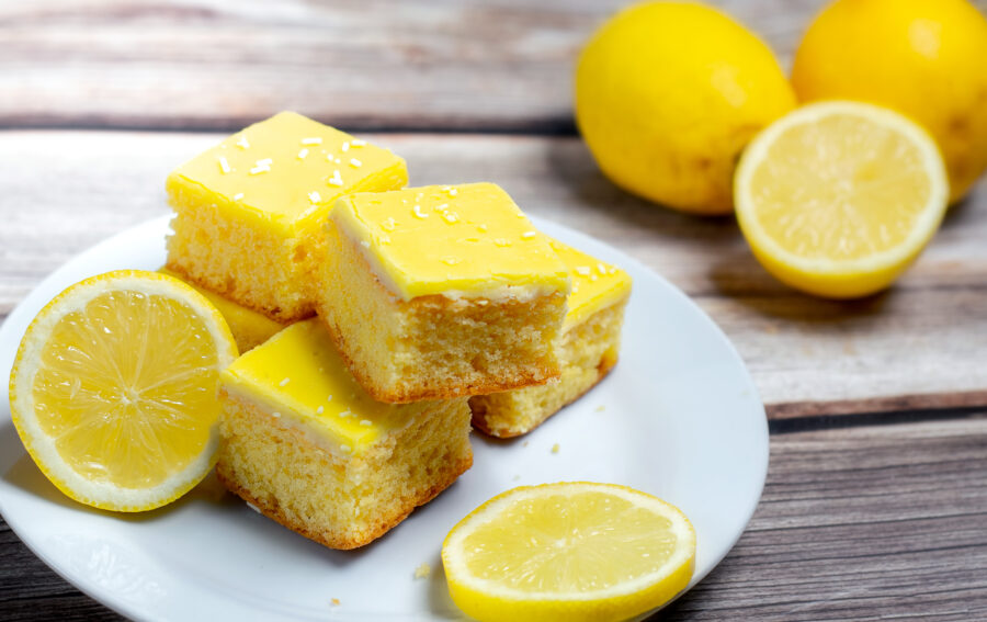 Fresh lemon cake slices on a plate.