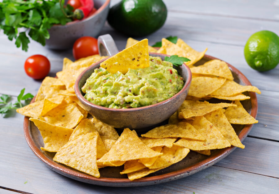 Guacamole avocado, lime, tomato, onion and cilantro, served with nachos - Traditional Mexican snack