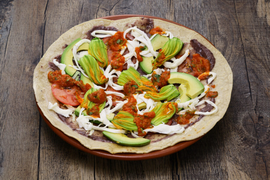 homemade open face vegetable tlayuda(before charcoal grilling), Mexican pizza