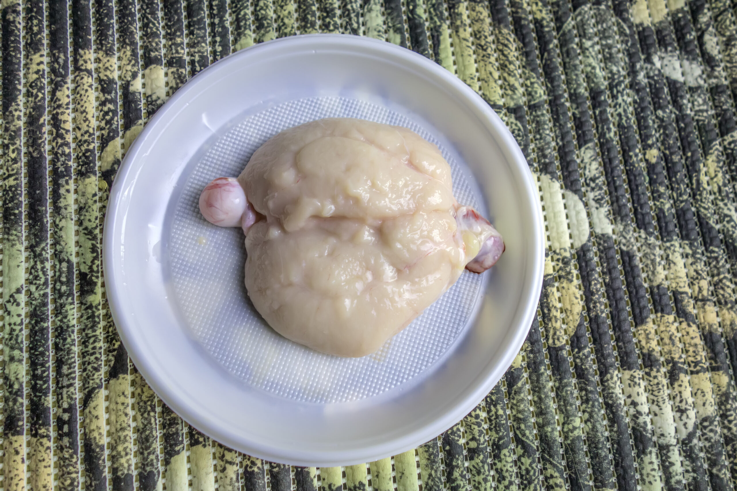 Skinned raw lamb testes before cooking.