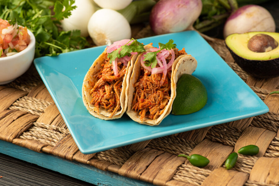 Mexican cochinita pibil tacos. Tacos mexicanos de cochinita pibil