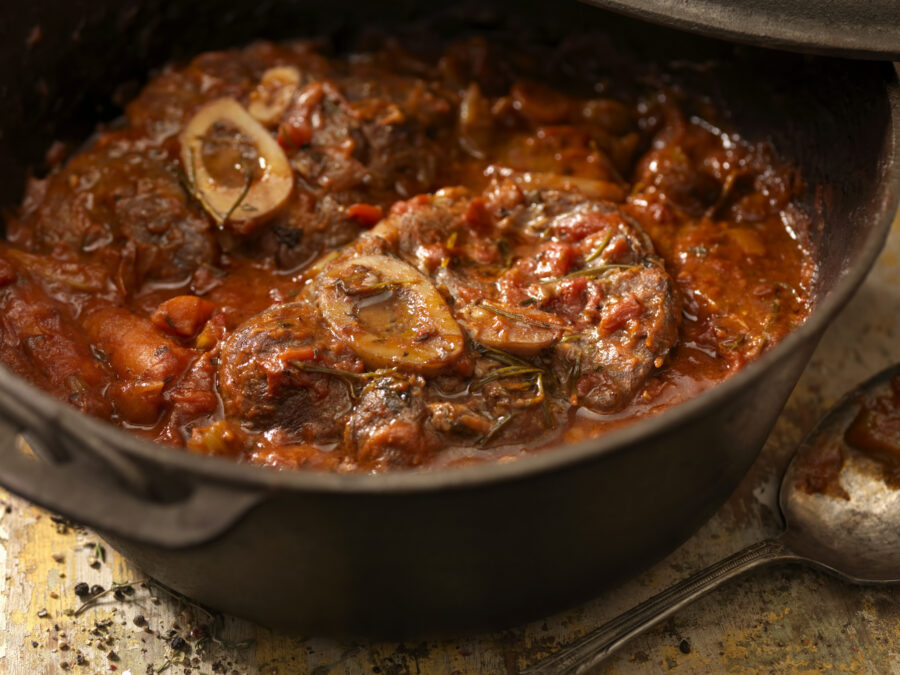 Osso Buco a Classic Italian Dish with Braised Veal Shanks, Stewed Tomatoes, Onions, Carrots, Celery and Fresh Herbs