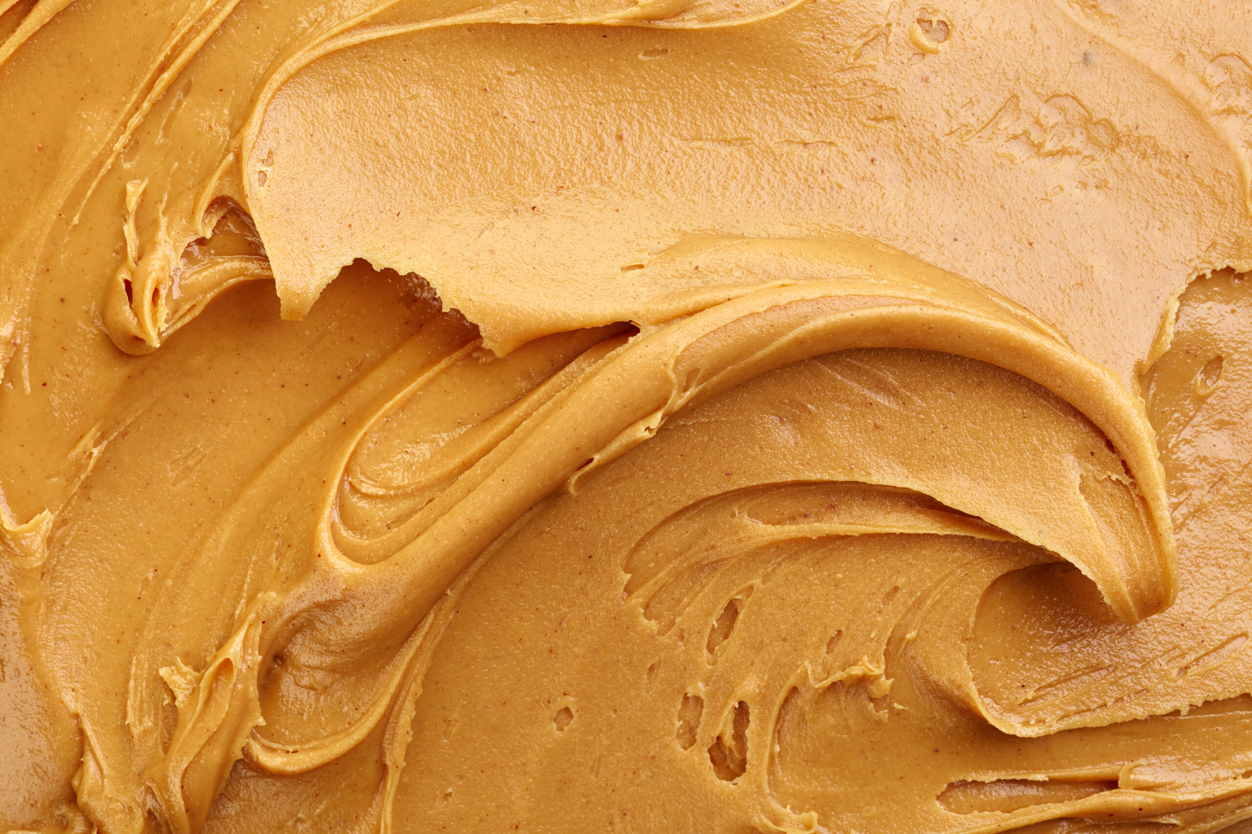 peanut butter background, top view