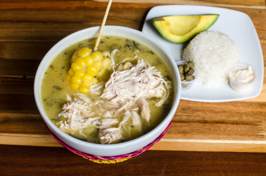 Traditional Colombian soup made with three varieties of potatoes, chicken breasts, corn and guasca herb.  It is garnished with capers, avocado slices and cream.