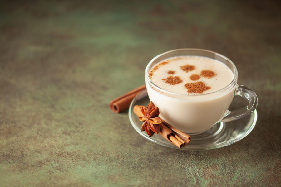 Turkish traditional hot drink salep on green background.