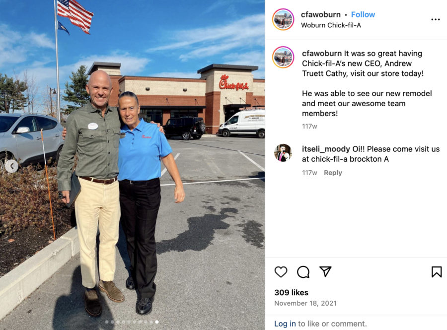 Photo of Andrew Cathy and Chick-fil-A employee in front of Chick-fil-A restaurant, posted on Instagram by @cfawoburn