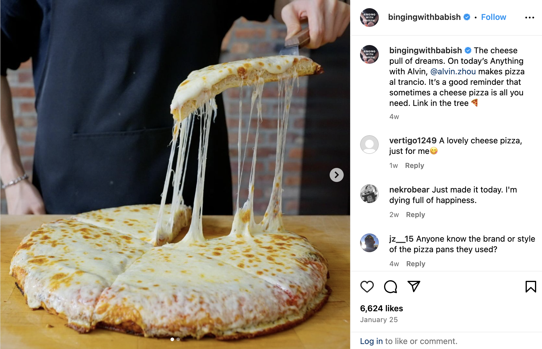 Man lifting cheesy pizza slice. Instagram post, by @bingingwithbabish