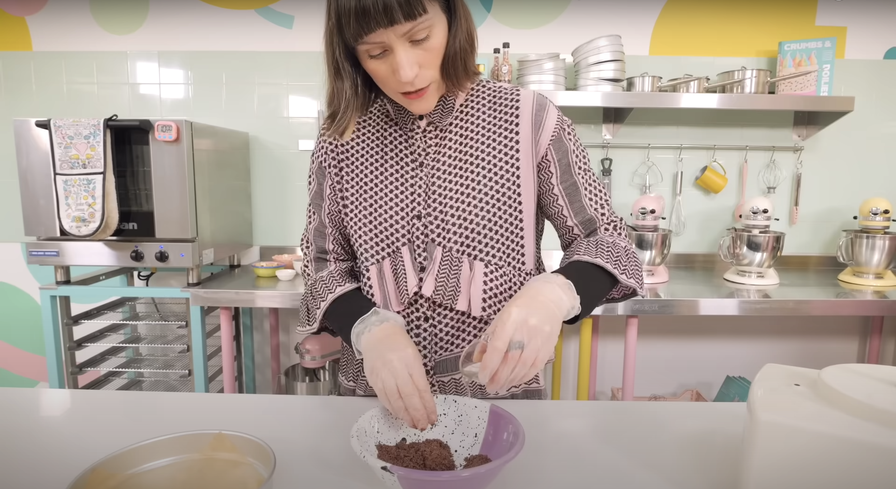 Jemma Wilson (a.k.a. Cupcake Jemma) bakes, in a YouTube video titled "What's better than Millionaires shortbread?!...BILLIONAIRES shortbread! | CupcakeJemma