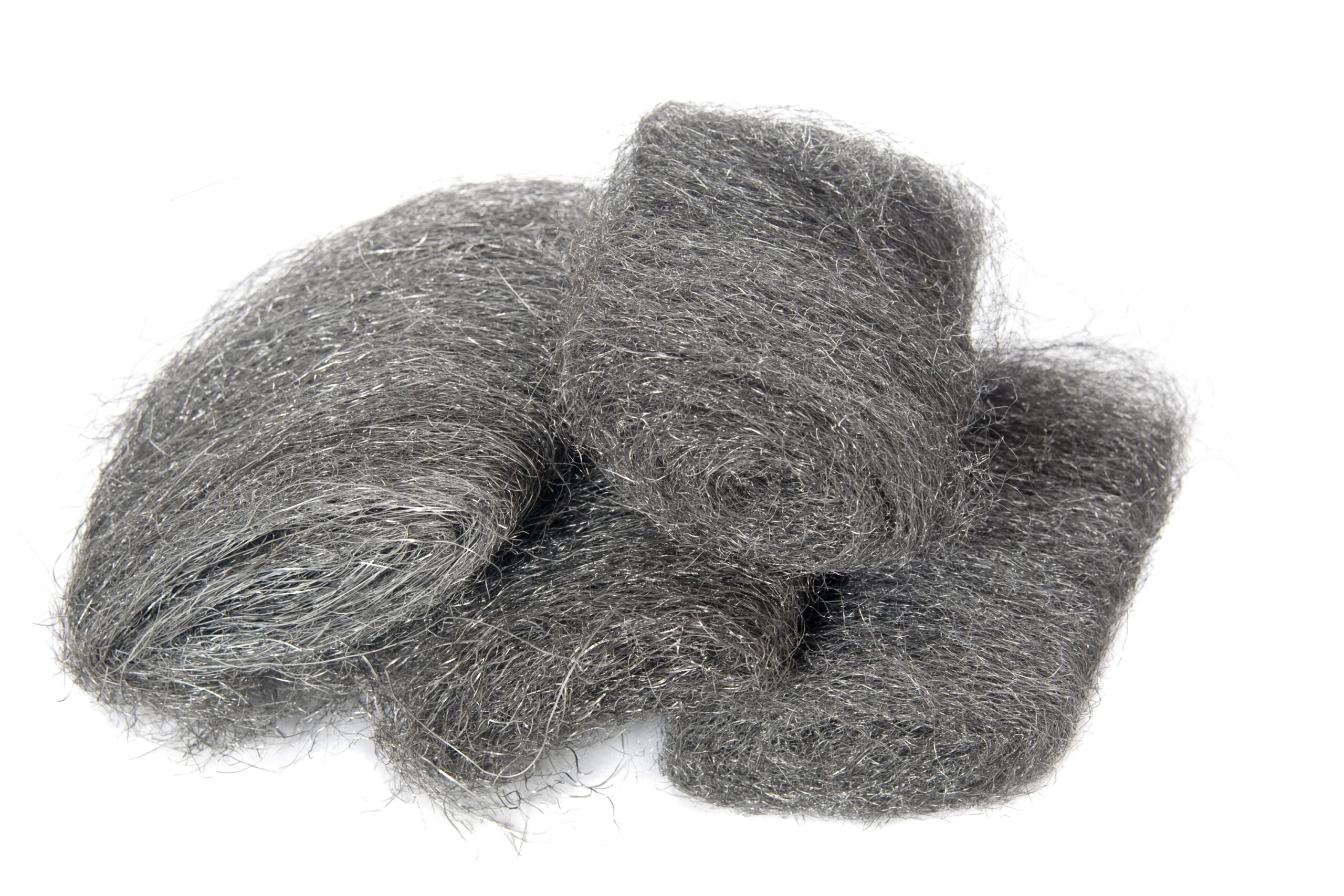 Close up of steel wool on a white background