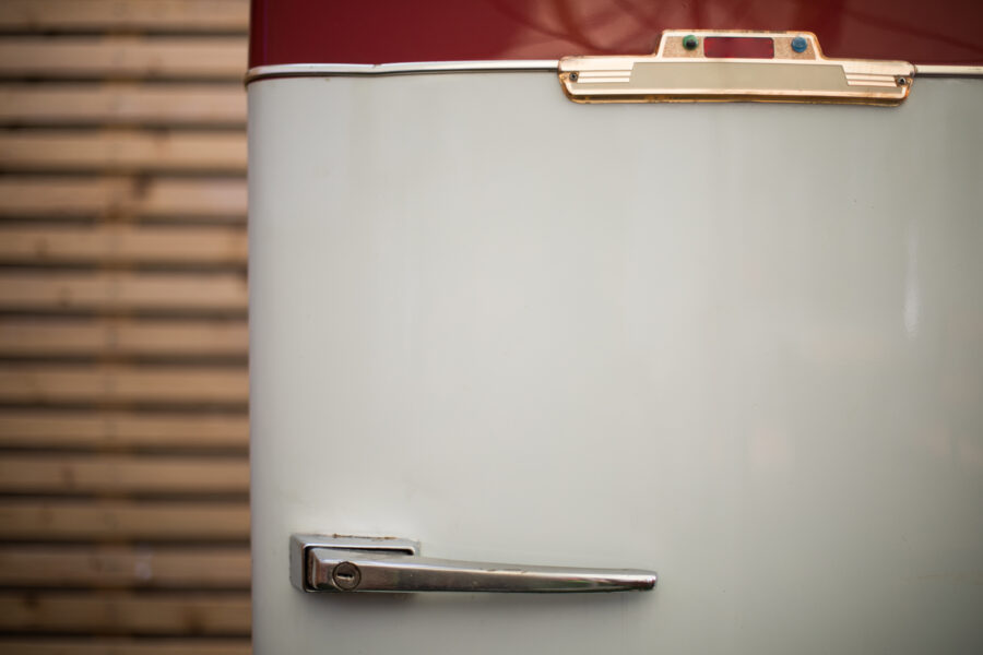 Close up shot of a vintage refrigerator.
