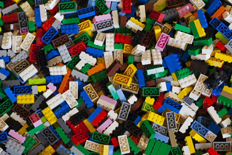 Copenhagen, Denmark - February 14, 2015: Color photo of a big pile of colorful Lego bricks. The photo is taken in a toy shop in Copenhagen. The Lego bricks fill the entire photo.