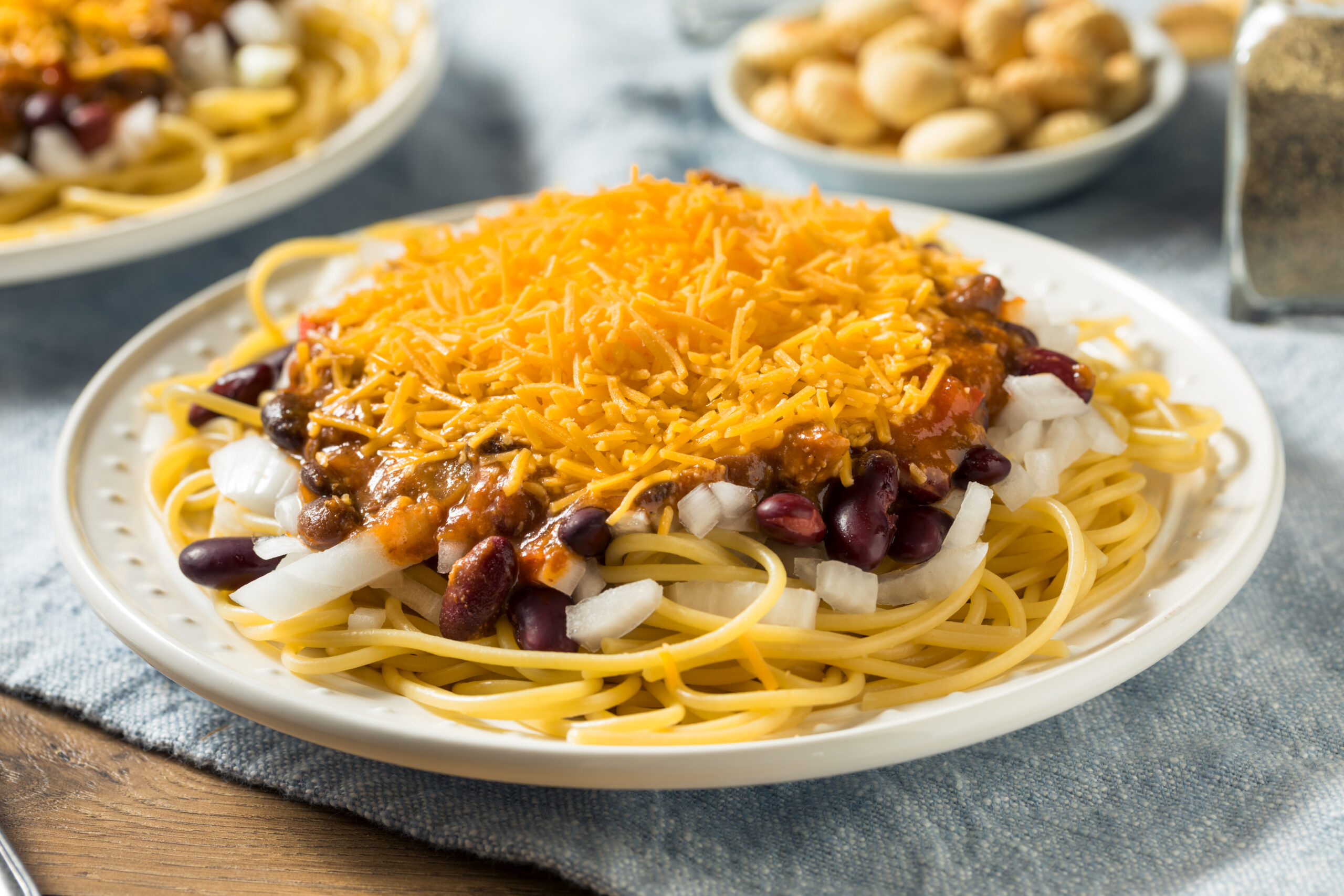 Homemade Cincinnati Chili Spaghetti with Cheese and Onion