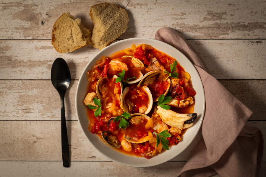 Homemade cioppino with clams, shrimp and crab claws.