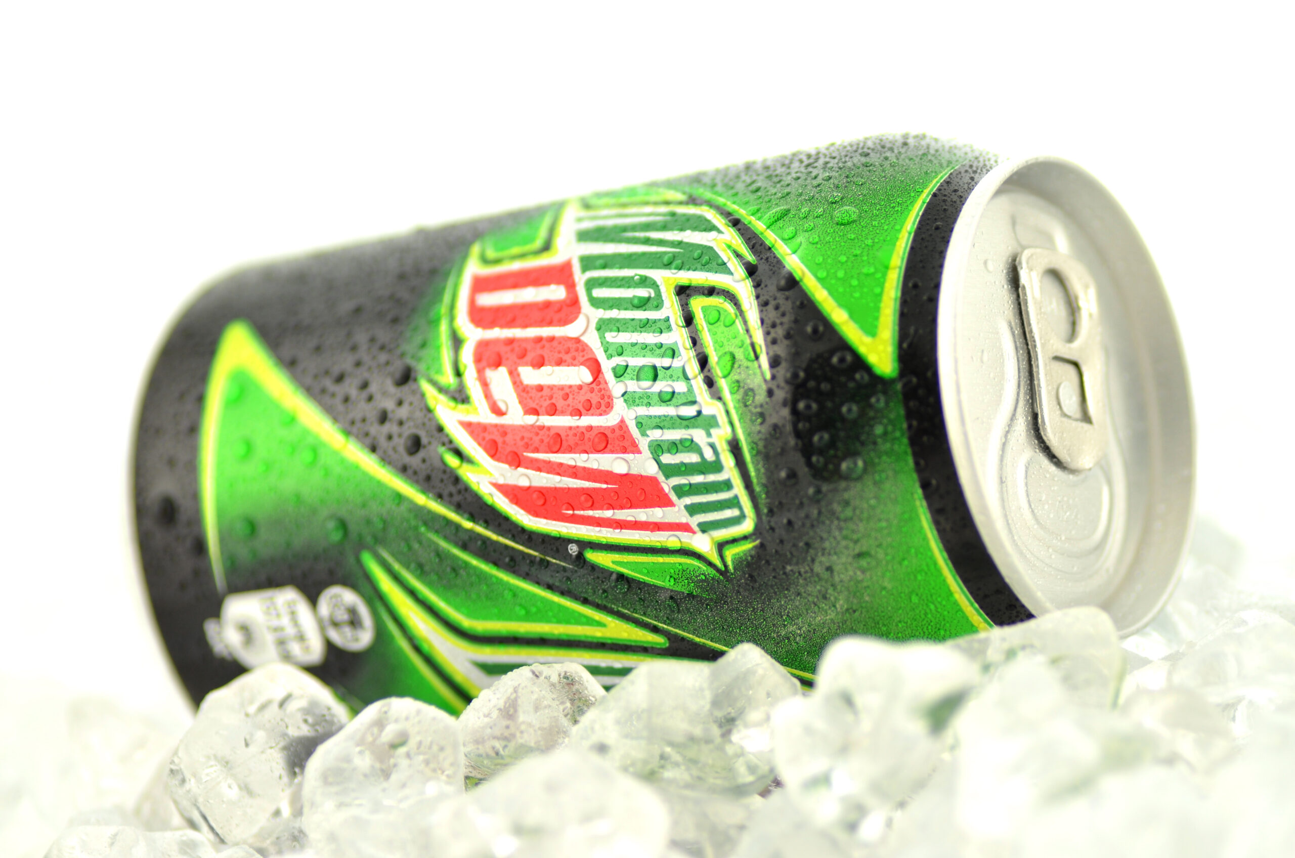 Can of Mountain Dew drink isolated on white.