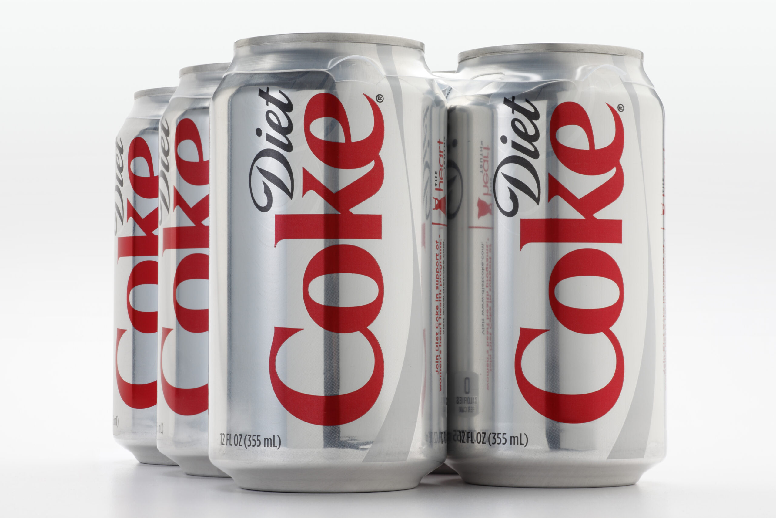 A six pack of 12 oz. Diet Coke cans isolated on a white background.