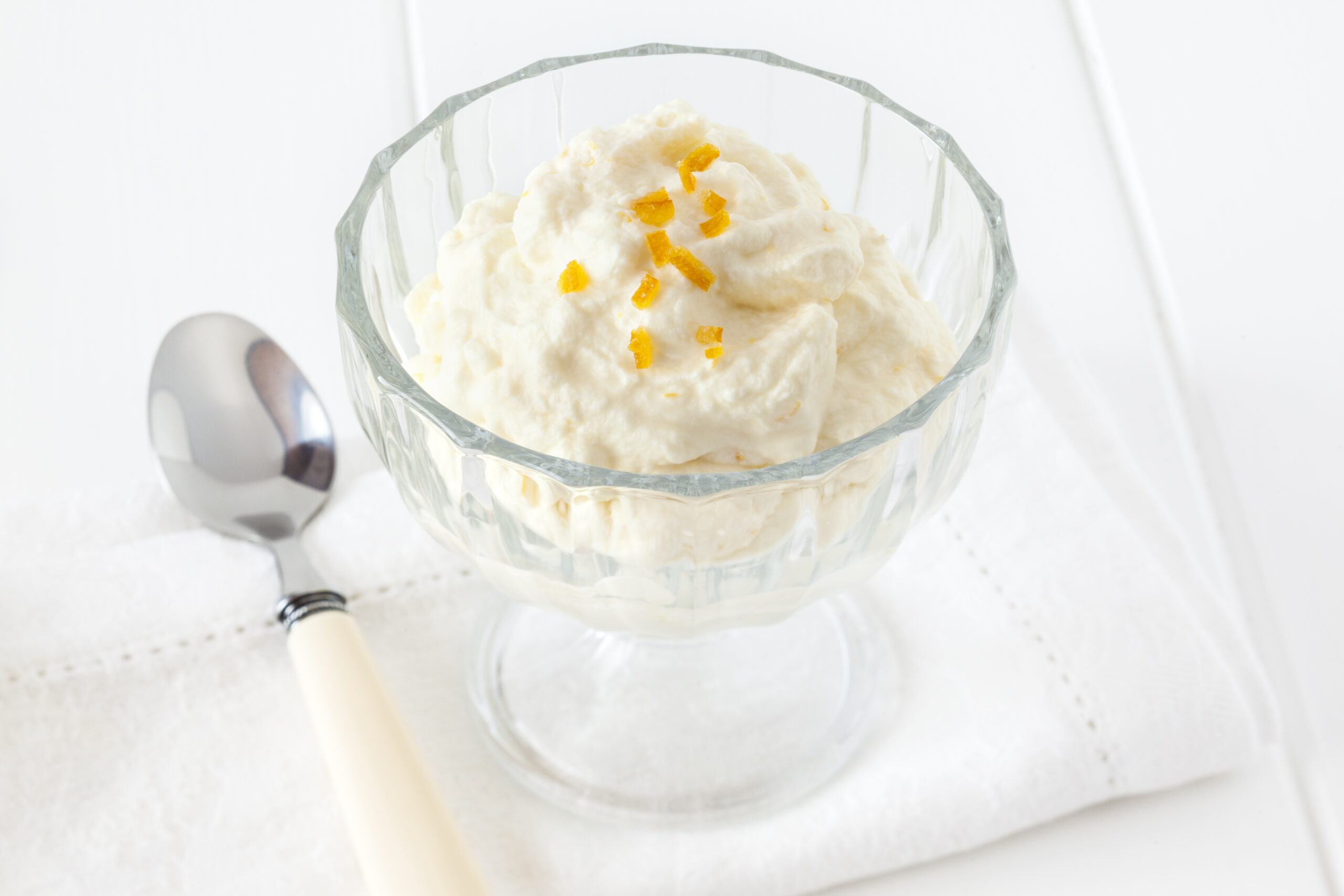 Syllabub - traditional English dessert made from whipped cream, light rum and flavoured with lemon and orange.